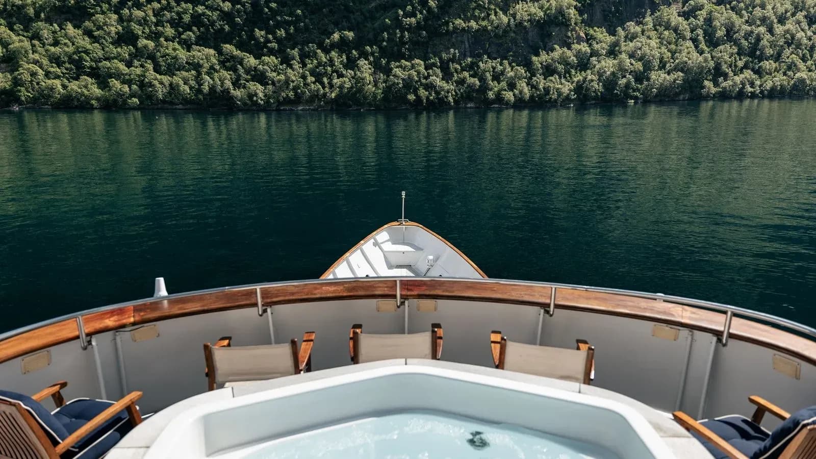 Forward view from Chantal’s jacuzzi across calm fjord water