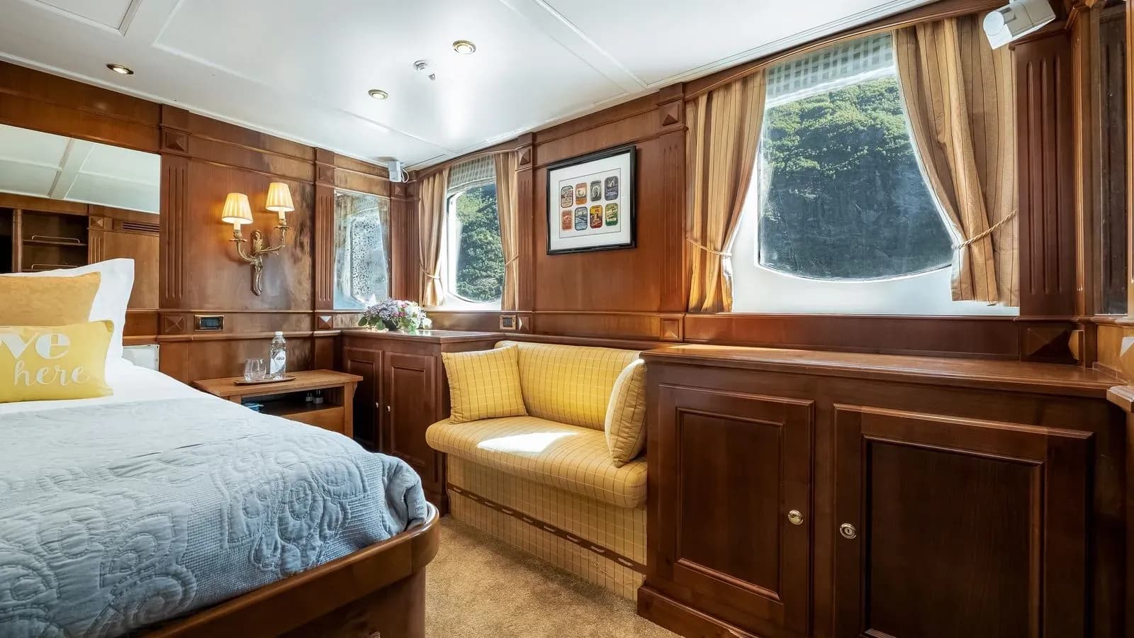 Window seating and double bed in Chantal’s owner’s suite