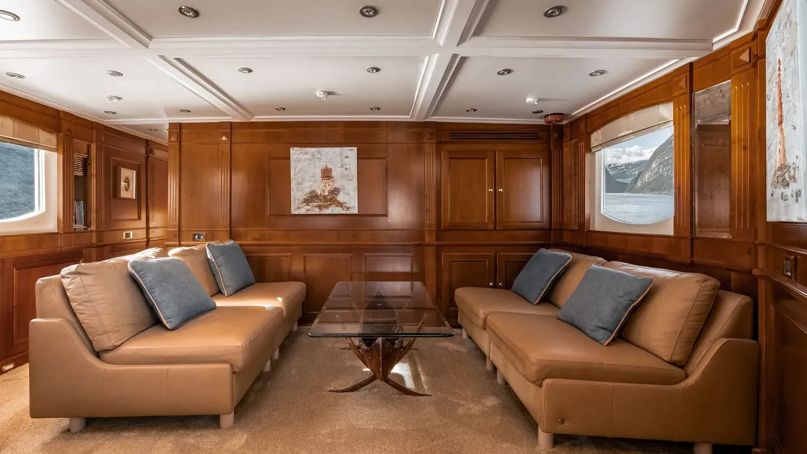 Private lower lounge with facing leather sofas