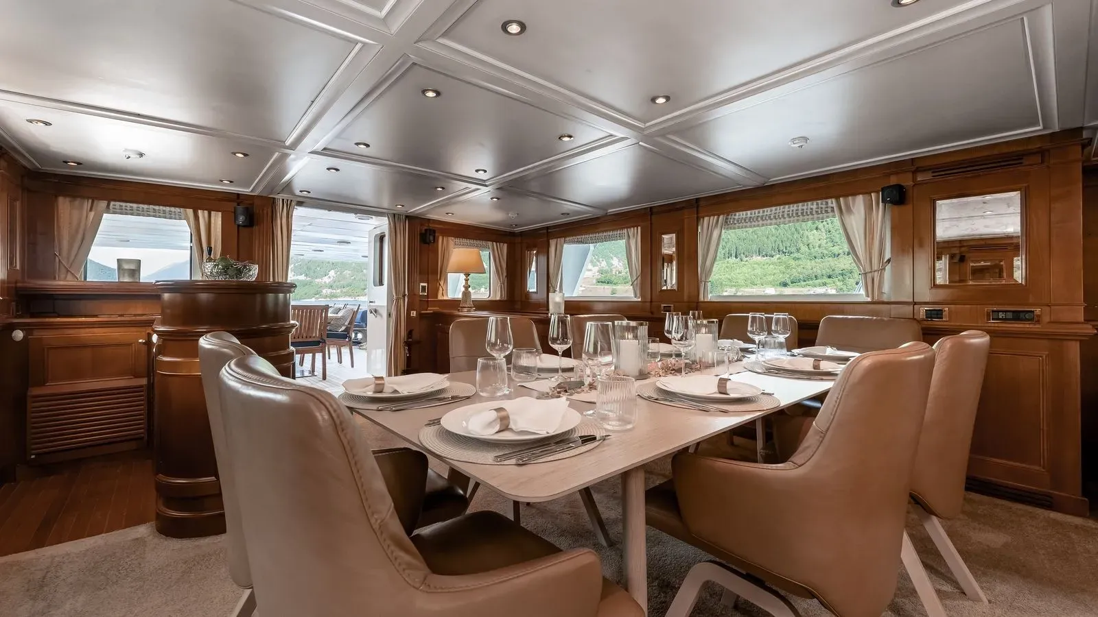 Formal dining table in Chantal’s wood-panelled main salon